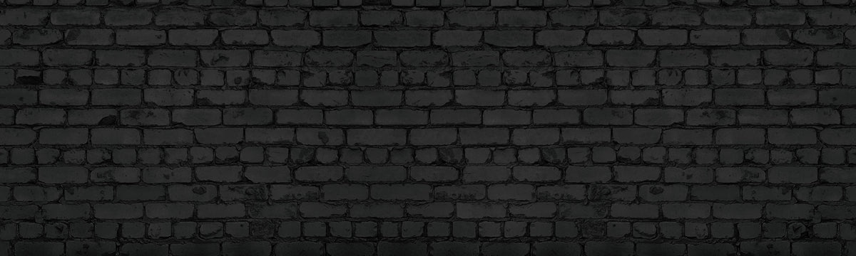 Küchenrückwand-Schwarze raue Backsteinmauer