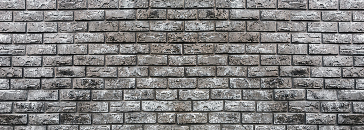 Küchenrückwand-Ziegelmauer aus dekorativem grauem Stein